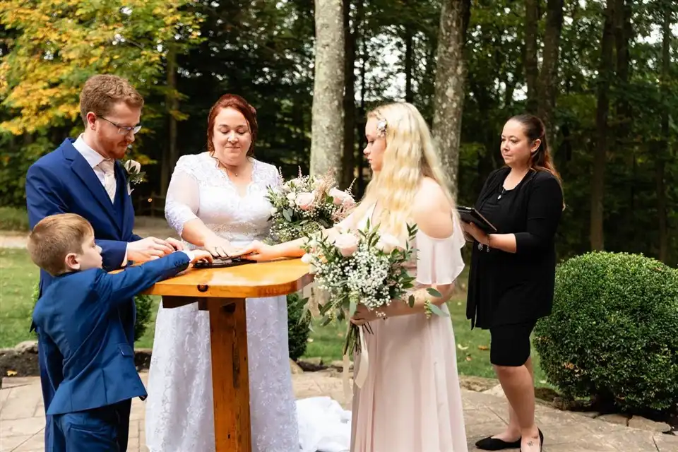 A unity puzzle being completed by the family in the wedding ceremony